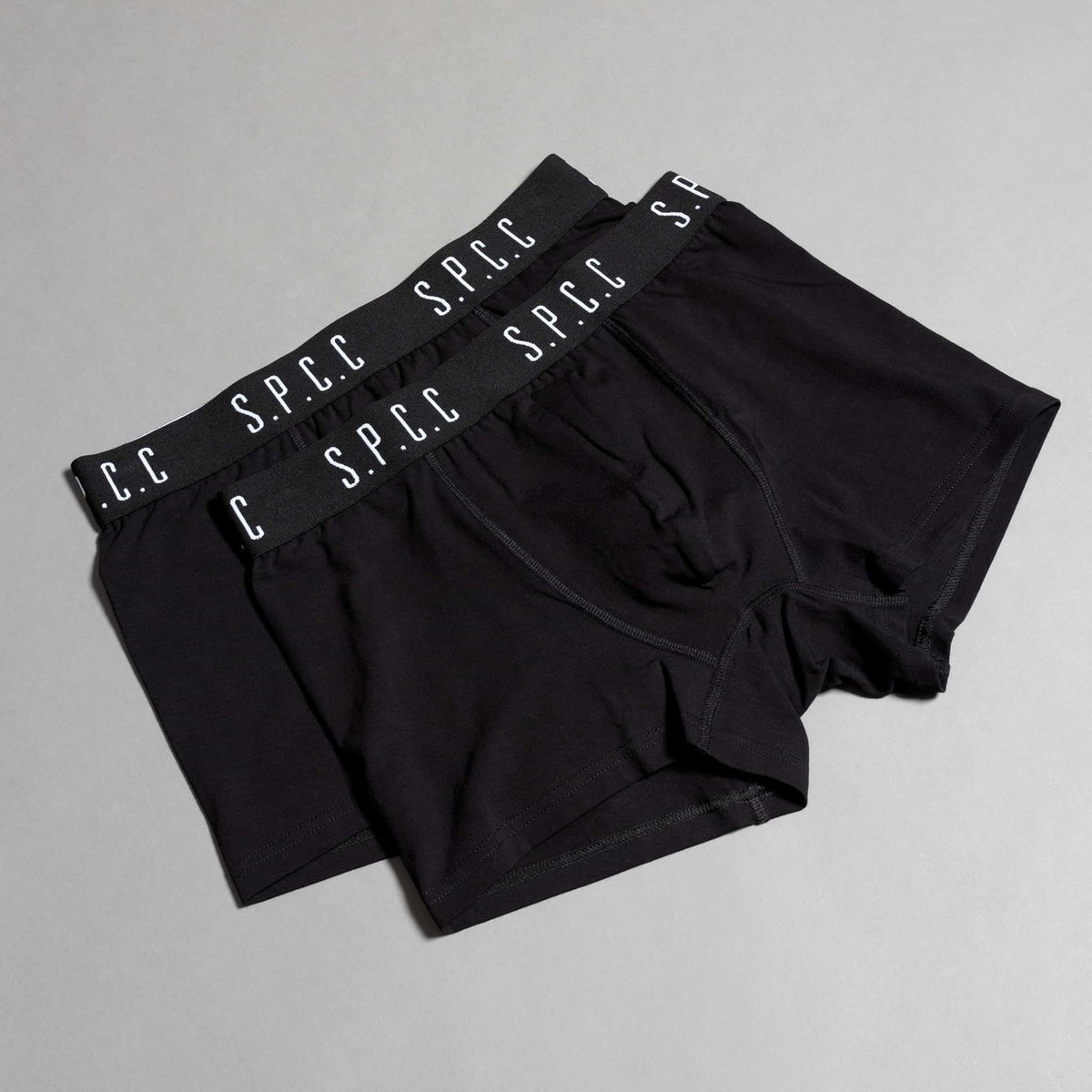 Black SPCC Emperador Boxer underwear for men, shown in a 2-pack with comfortable fit and soft fabric.