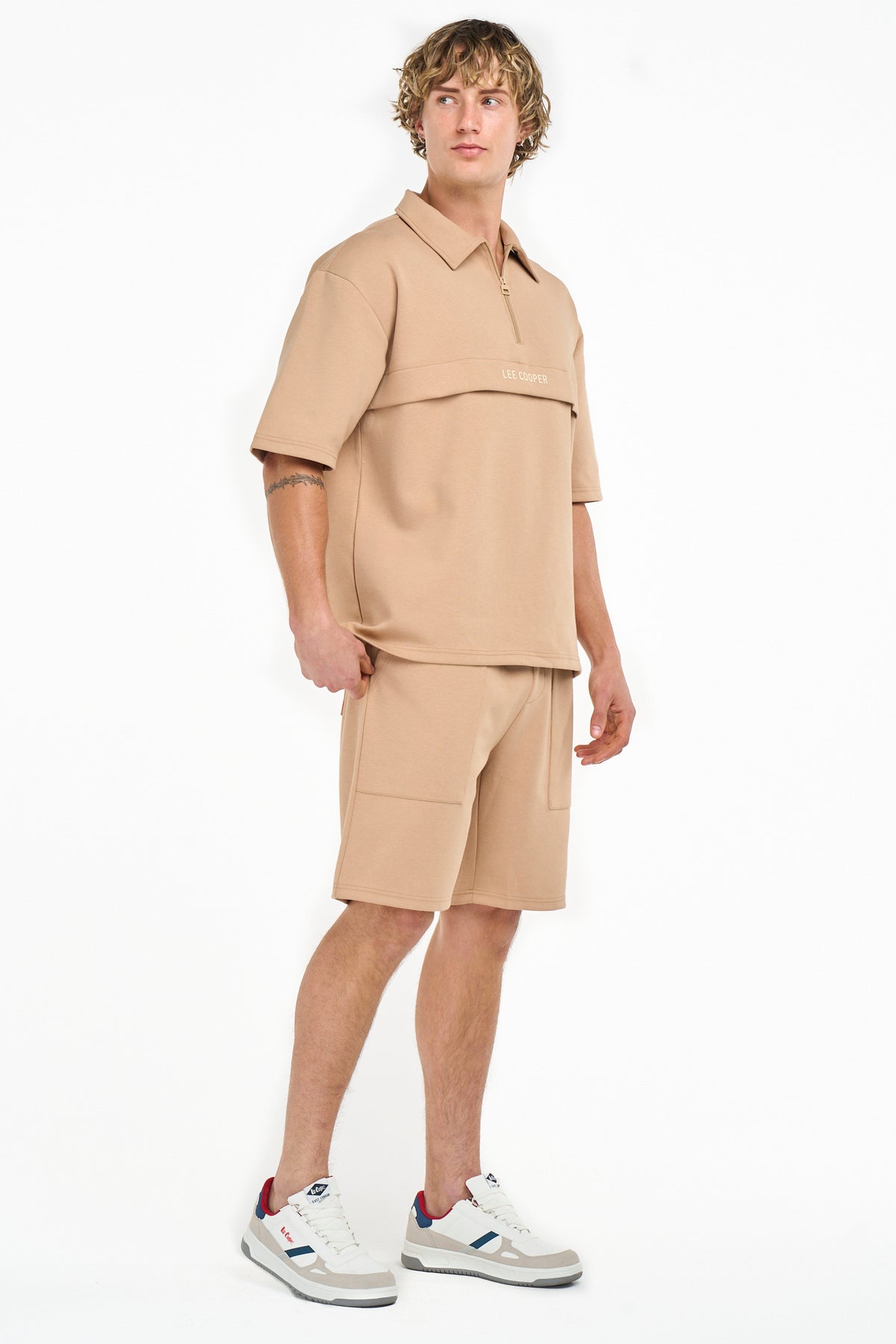 Brown Lee Cooper Max men's shorts, casual bermuda style, with belt loops and pockets, displayed on a neutral background.