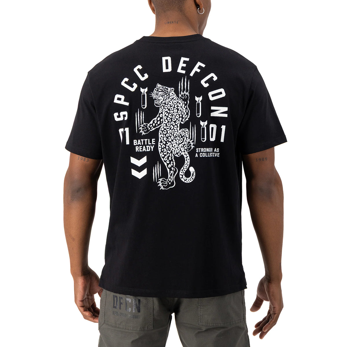Black SPCC DEFCON Madra T-shirt for men featuring a graphic design on the front.