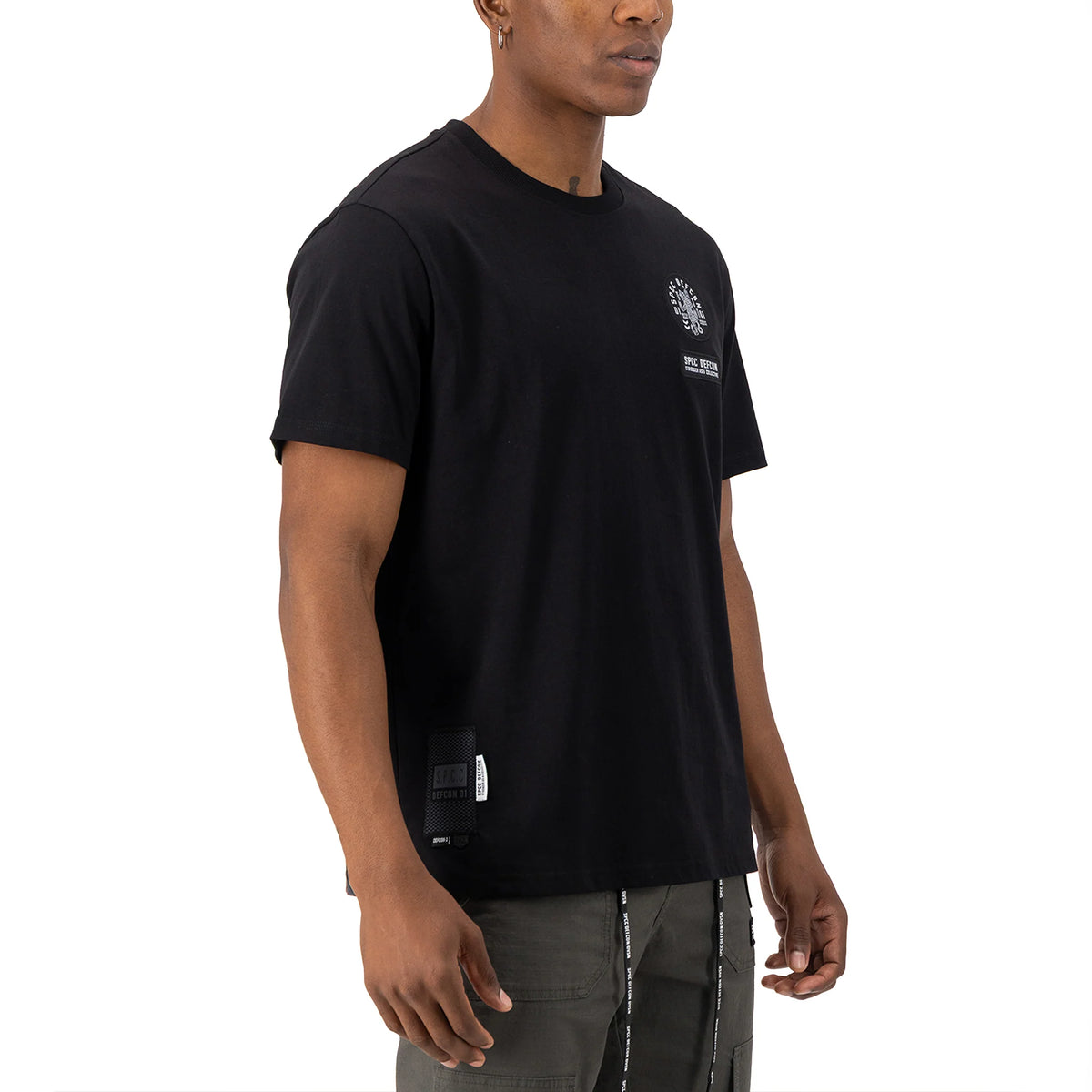 Black SPCC DEFCON Madra T-shirt for men with a graphic design, casual fit, and crew neckline.