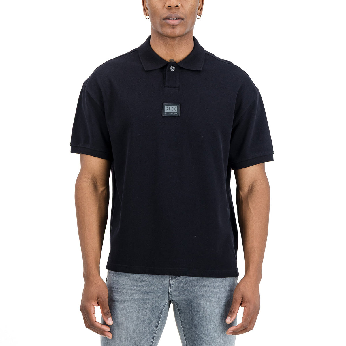 Men's SPCC Nohr Golfer in black, showcasing the sleek design and comfortable fit of this stylish golf shirt.