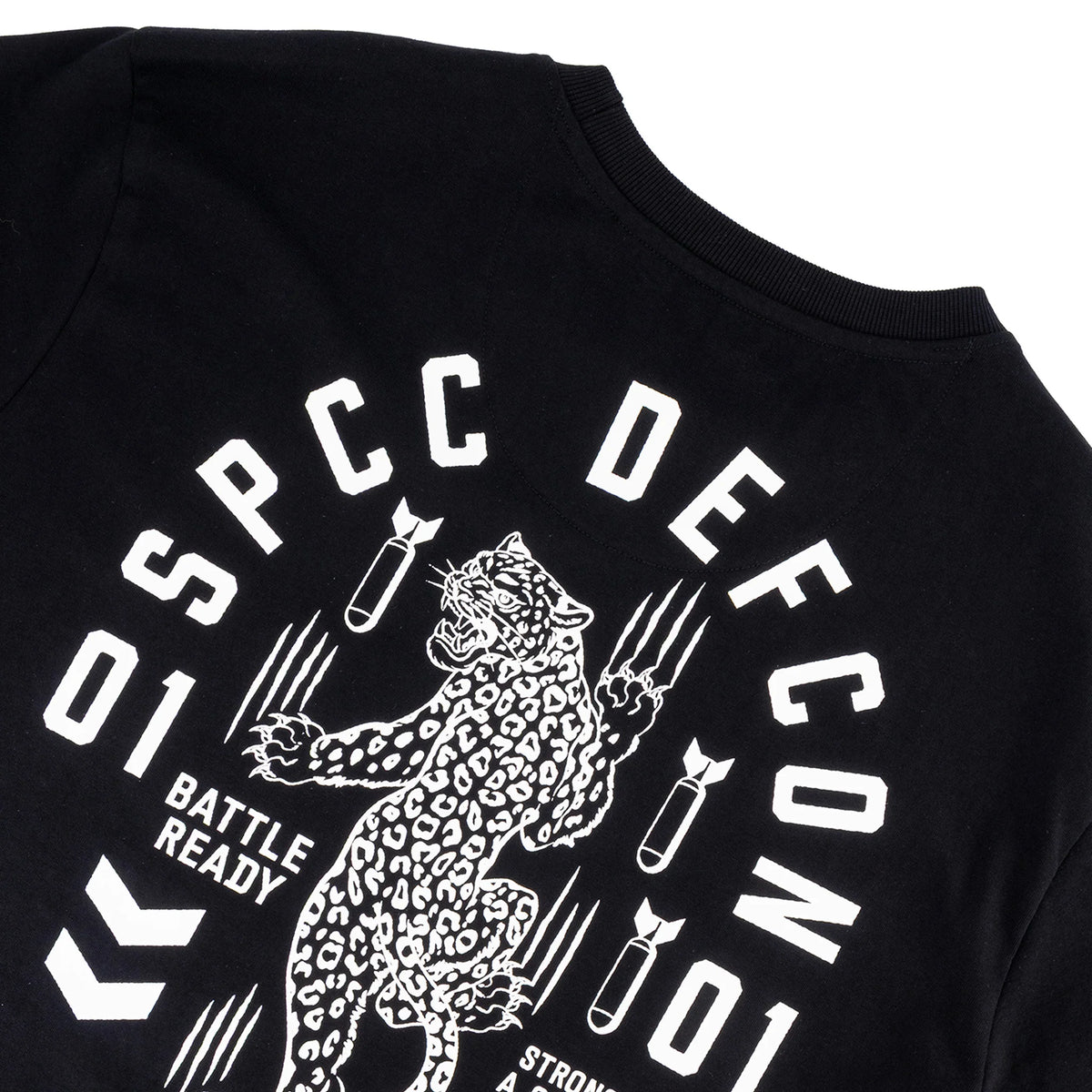 Black SPCC DEFCON Madra T-shirt for men featuring a bold logo design on the front.