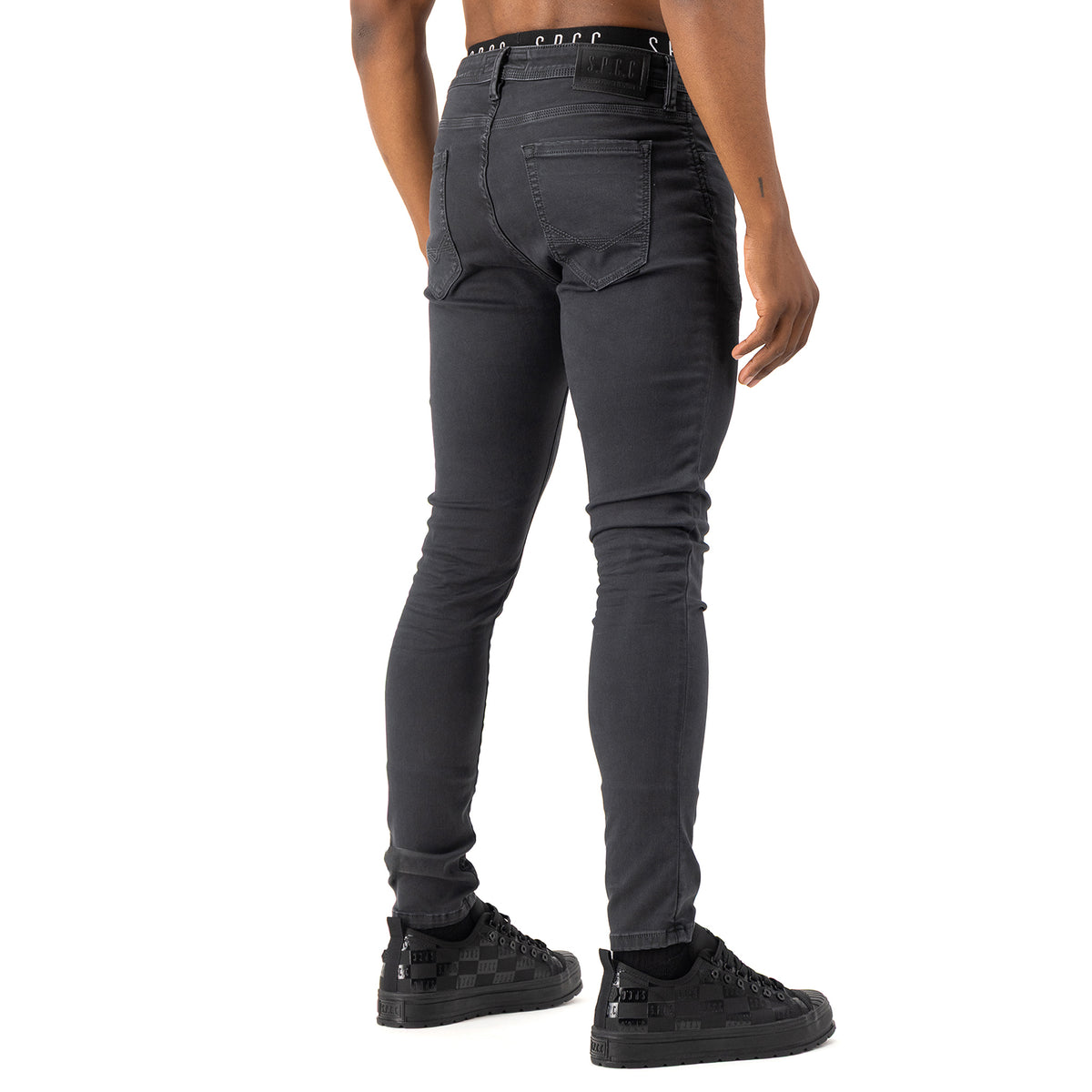 Men's SPCC Rodan Redrafted Jeans in charcoal, showcasing a fitted design with classic denim texture and stylish details.