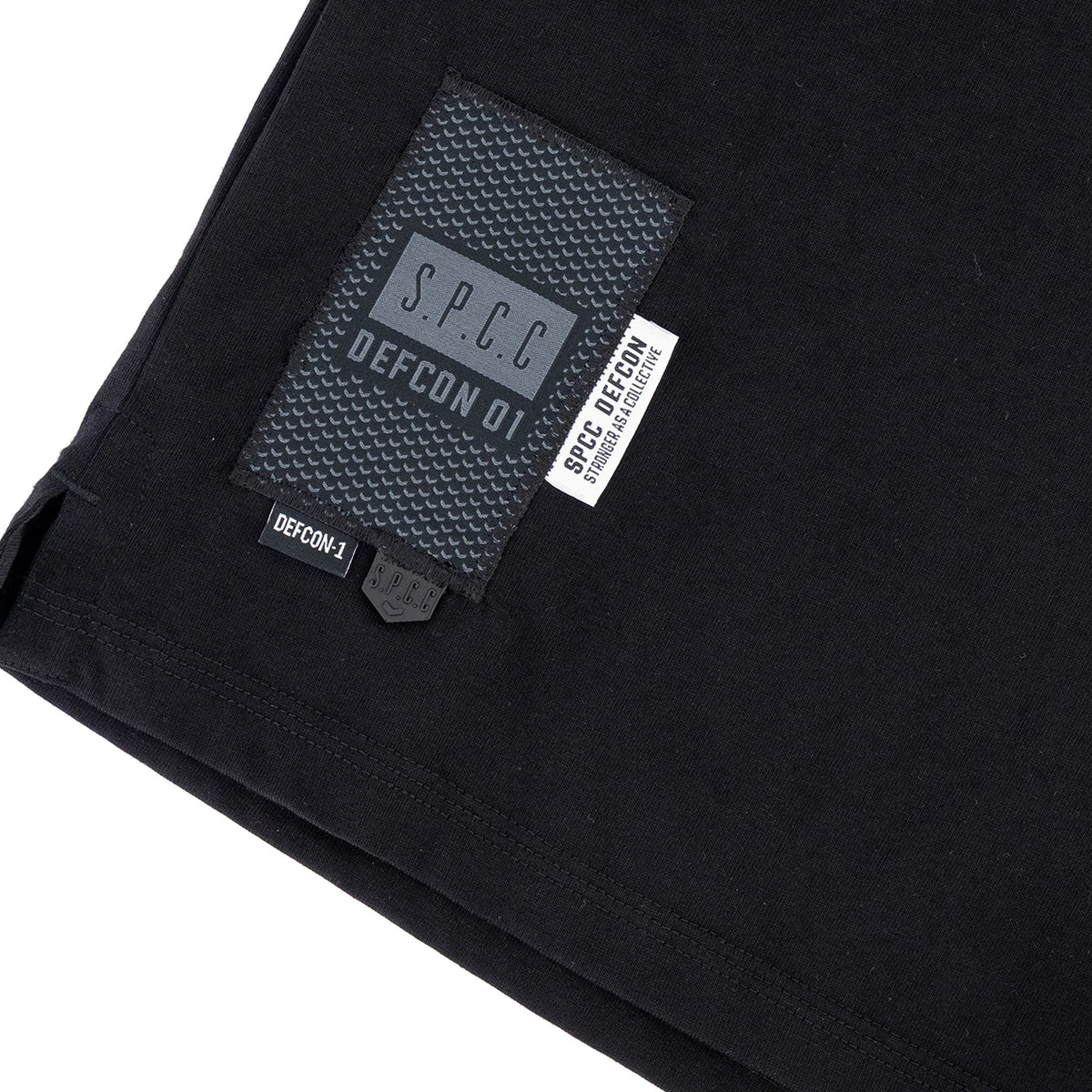 Black SPCC DEFCON Madra T-shirt for men with a graphic design on the front, made from comfortable cotton fabric.