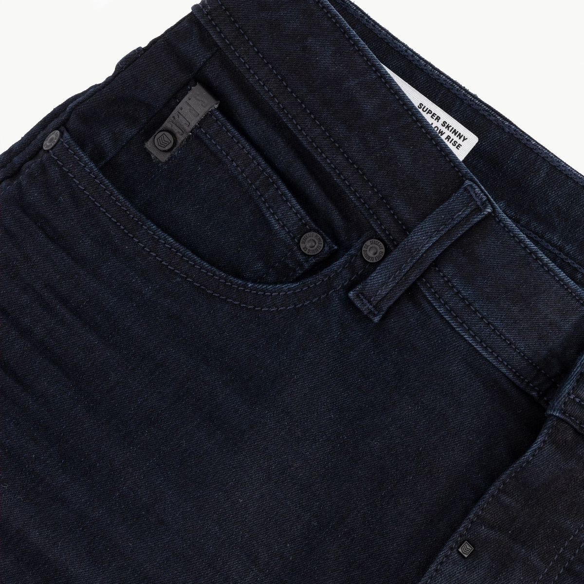 Black Spcc Eclipse men's jeans with a slim fit and classic five-pocket design displayed on a mannequin.