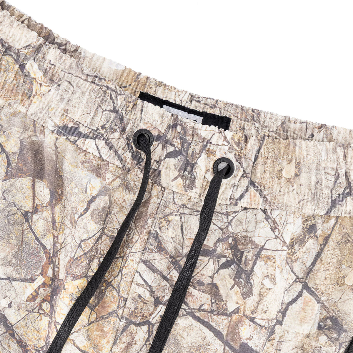 Men's Spcc Incognito Woven Short in stone color, casual Bermuda shorts with a textured fabric and comfortable fit.