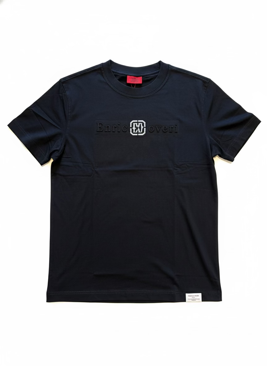 Black t-shirt with a logo on a textured surface
