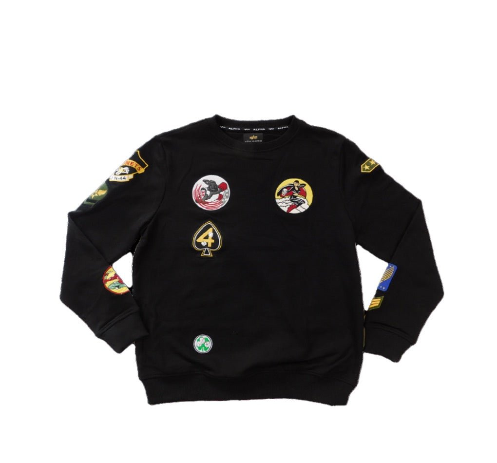 Black men's crew sweatshirt from ALPHA featuring multi badge design on the chest, made from soft, comfortable fabric.