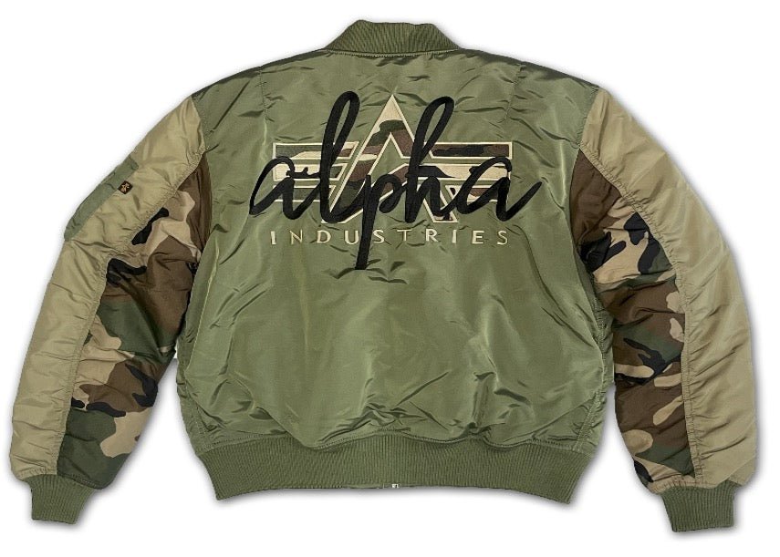 Unisex Alpha MA-1 camouflage embroidered jacket in sage green with ribbed cuffs and collar, casual military-inspired style.