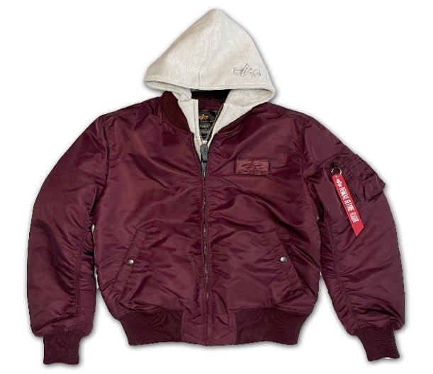 Alpha ALPHA MA-1 DTEC jacket in dark cherry, unisex bomber style with ribbed cuffs and collar, front zip closure, and utility pockets.