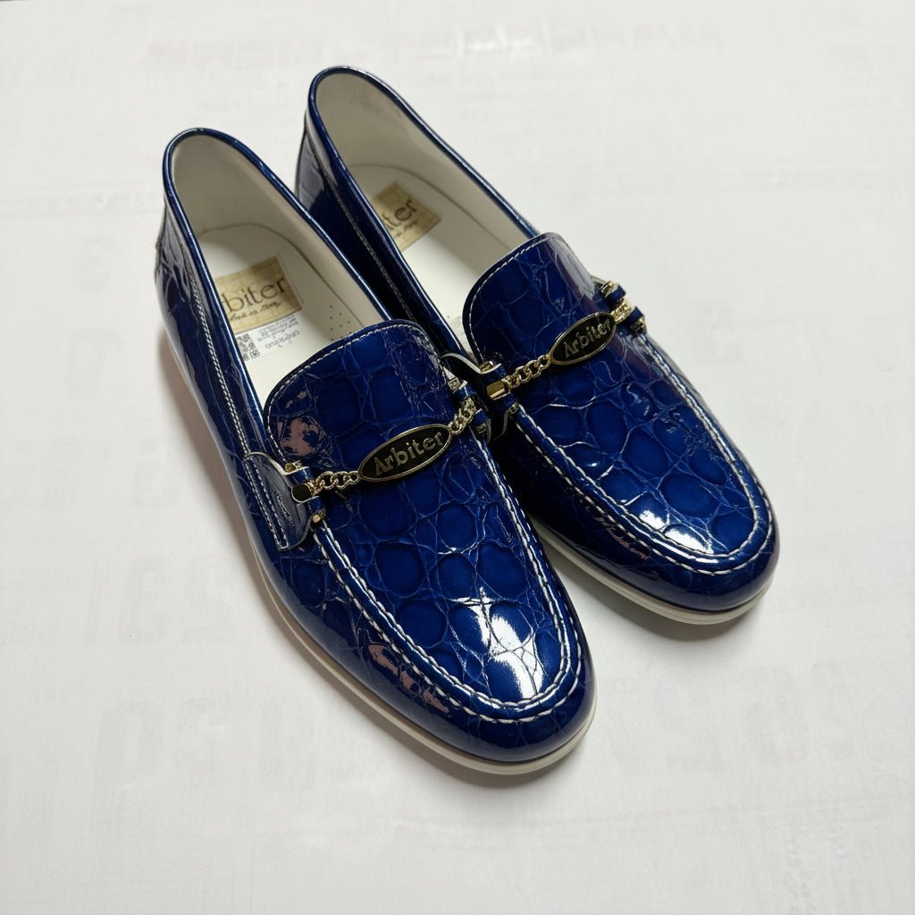 Men's casual footwear Arbiter Print Cocco Royal sneakers with patterned design and white soles.