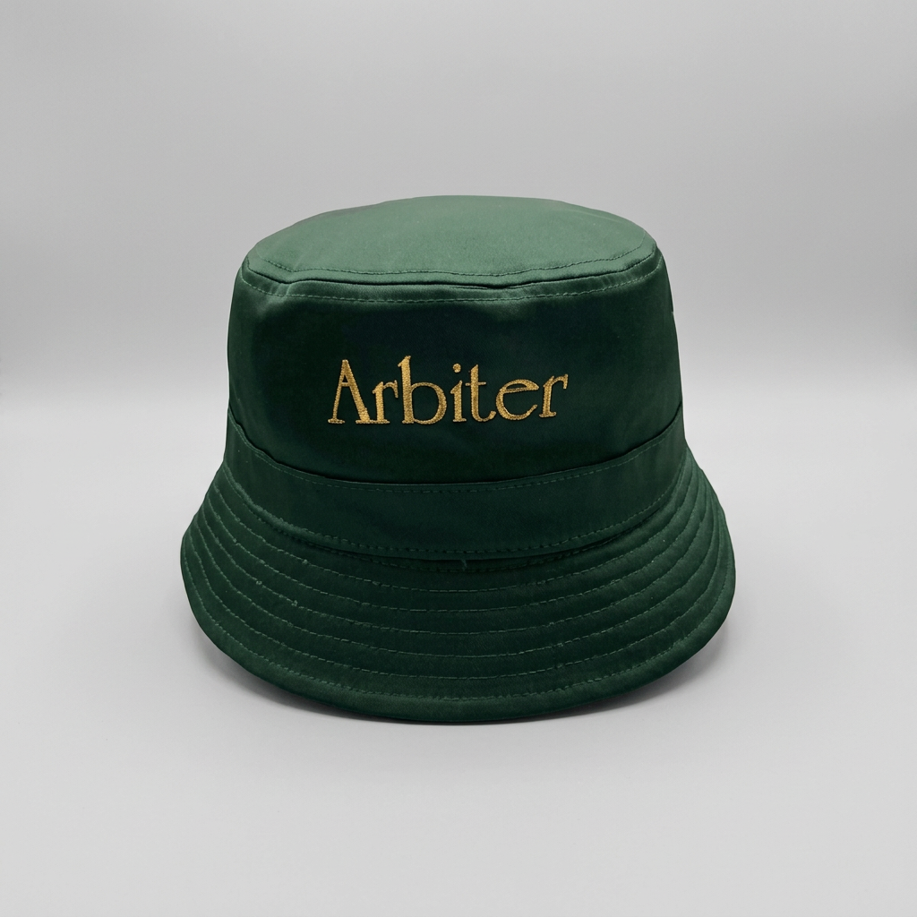Green Arbiter satin bucket hat for unisex headwear, featuring a stylish, smooth satin fabric and relaxed brim.