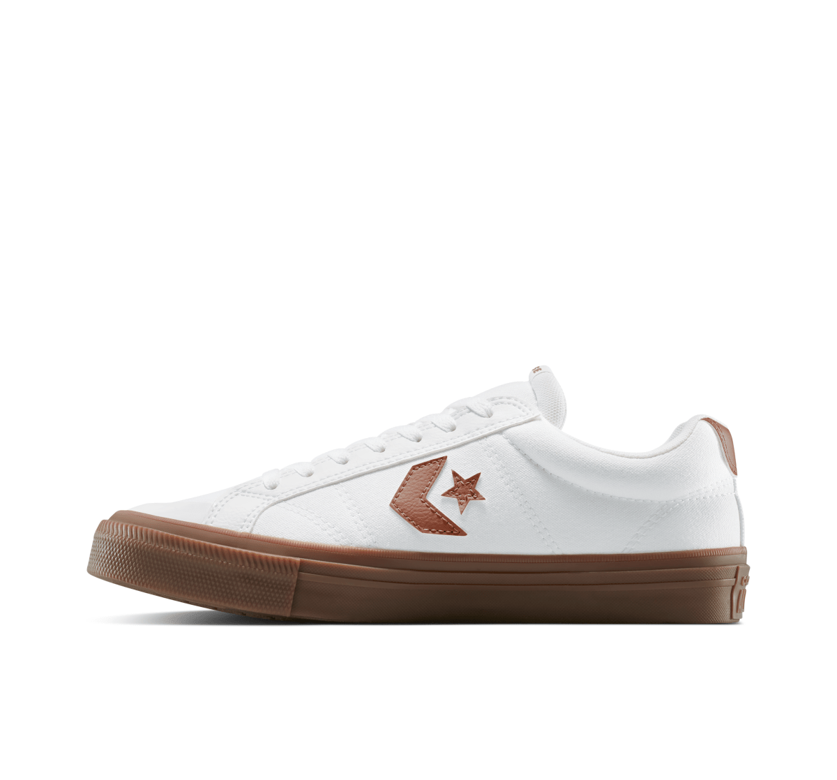 White and red Converse unisex sport casual sneakers with classic design, featuring canvas uppers and rubber soles.