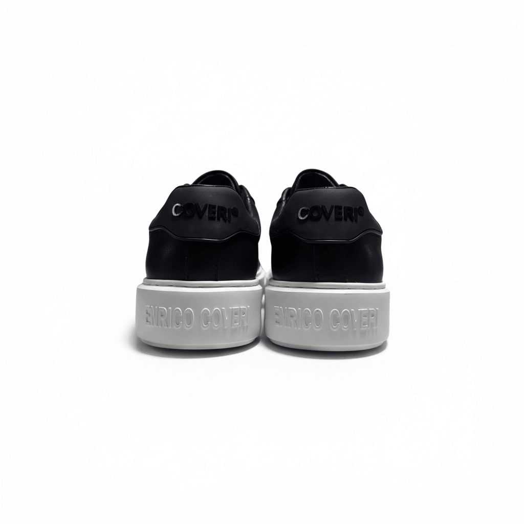 Black leather Enrico Coveri men's cupsole sneaker with sleek design and casual style, perfect for everyday wear.