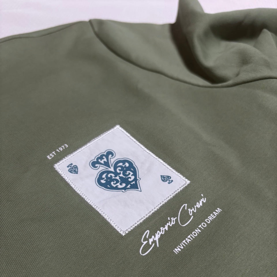 Green Enrico Coveri men's sweater with a classic fit and ribbed cuffs, showcasing a stylish knit design.