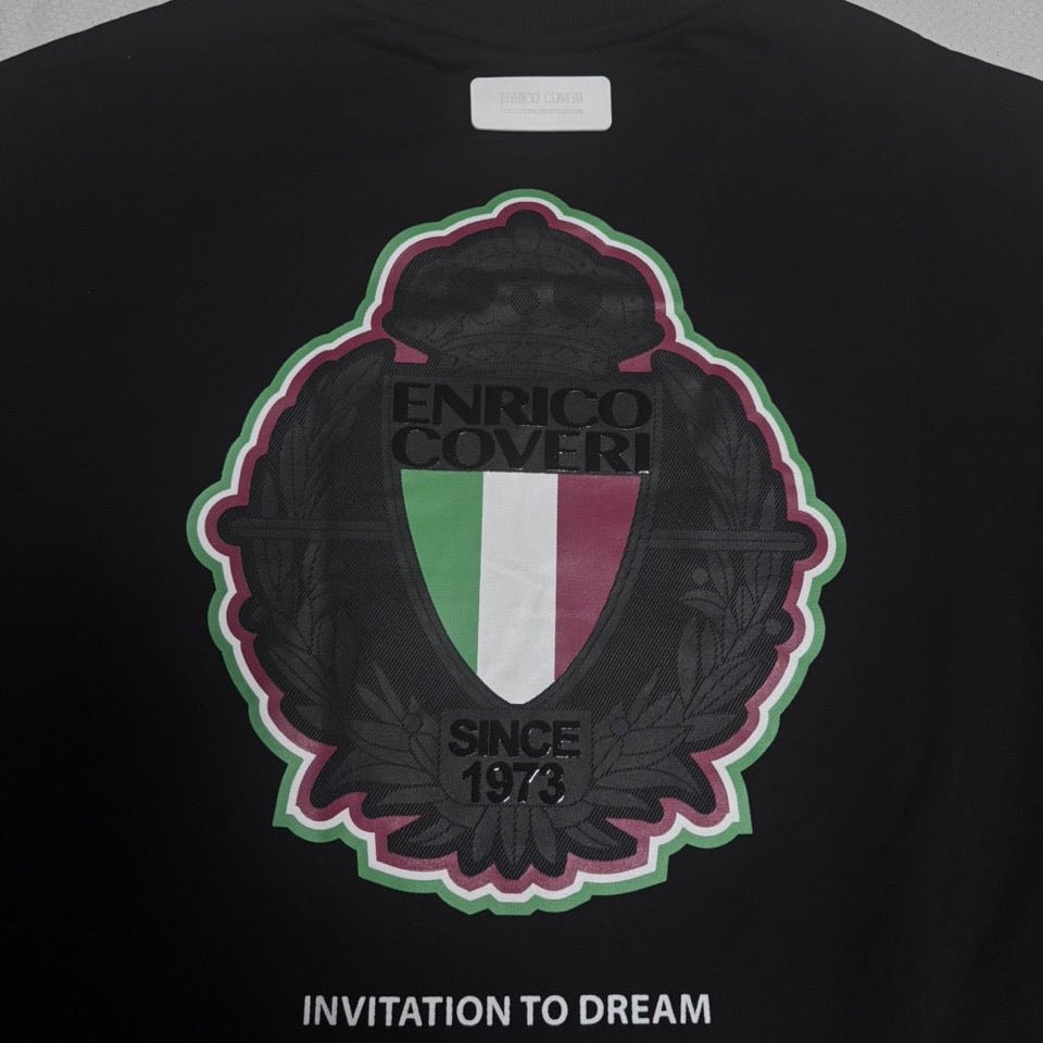 Black Enrico Coveri men's sweater with a classic fit, featuring a smooth knit texture and subtle brand logo detail.