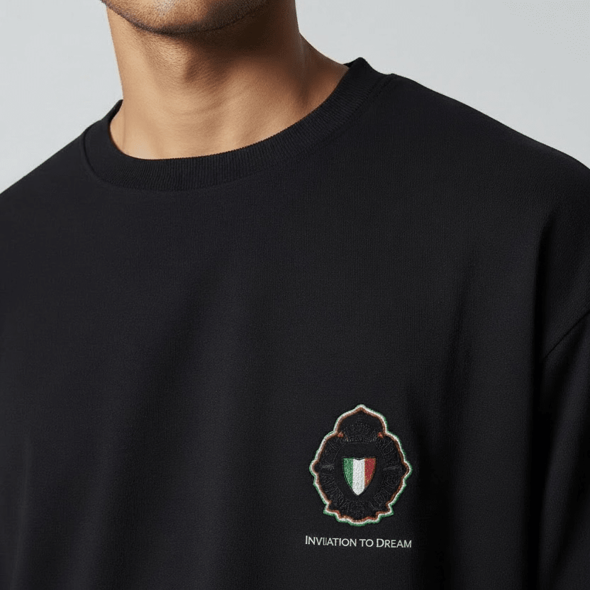Black Enrico Coveri men's sweater with a classic knit design, featuring a crew neckline and subtle brand logo detail.