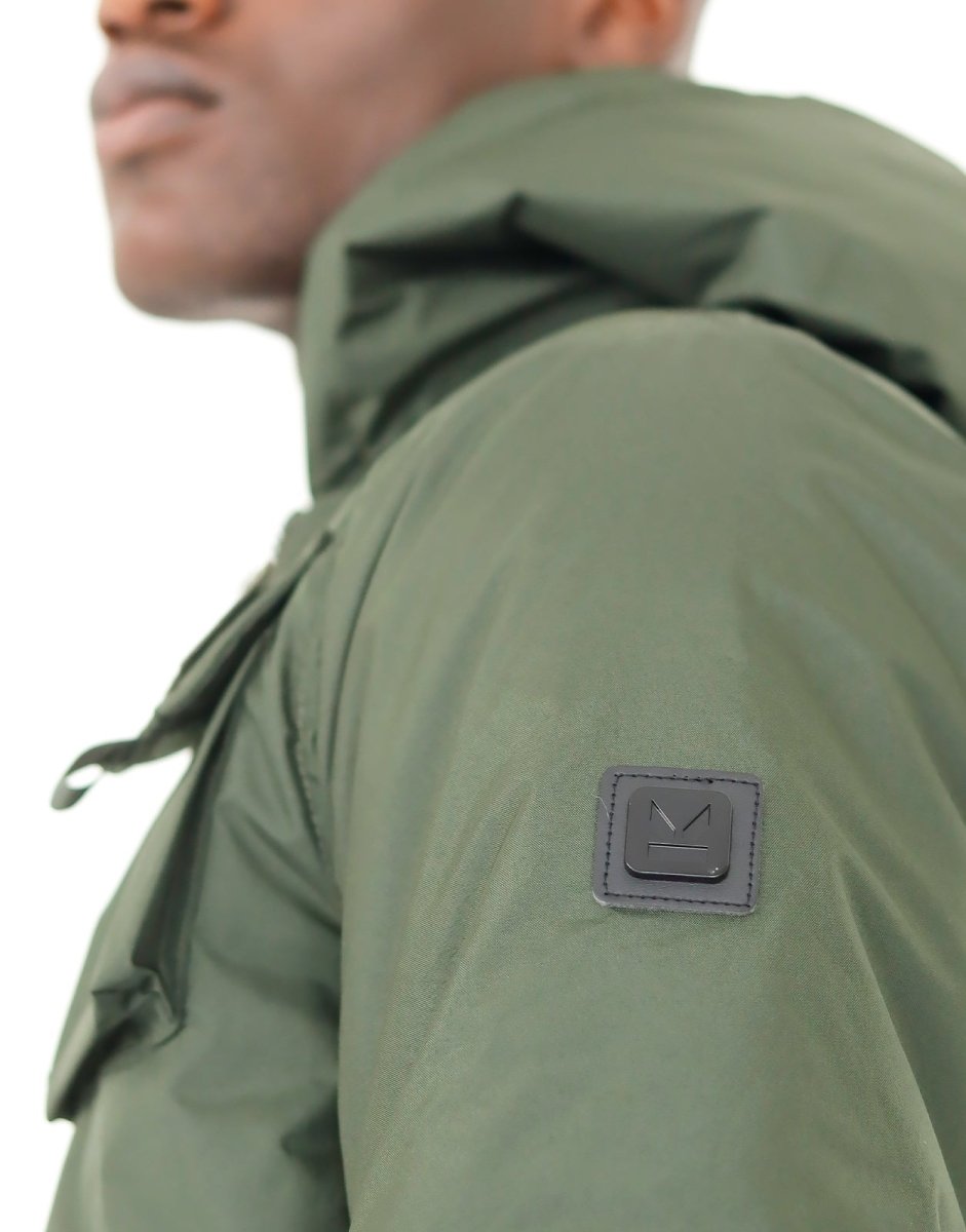 Men's Klevas Union Jacket in olive color, stylish and functional with a modern design, shown on a mannequin.