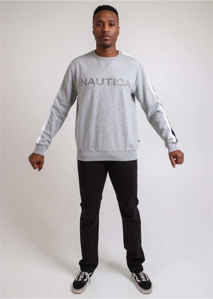 Nautica men's grey heather top with a crew neckline and long sleeves, featuring subtle Nautica branding.