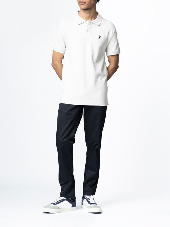Men's white Polo stretch pique golfer shirt, casual men's golf apparel by POLO, showing front view of the polo shirt.