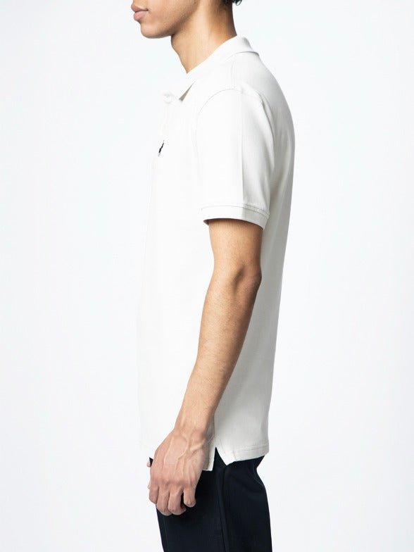 White Polo men's stretch pique golfer shirt with classic collar and short sleeves, styled for casual or golf wear.