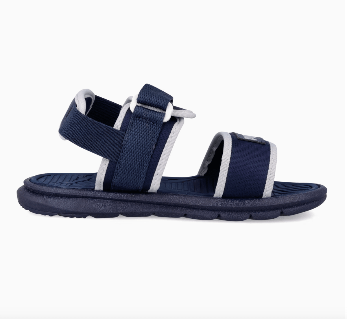 Puma Infants Crony Soft 2.0 kids sandals in navy with white accents, featuring adjustable straps and cushioned soles.