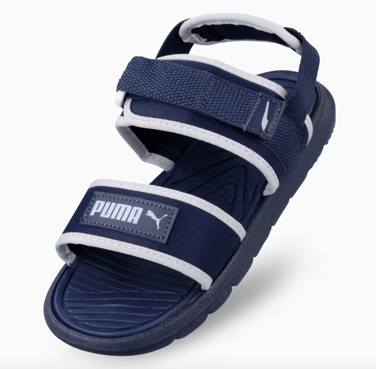 Puma infants Crony Soft 2.0 kids sandals in navy with white accents, open-toe design, and adjustable straps.