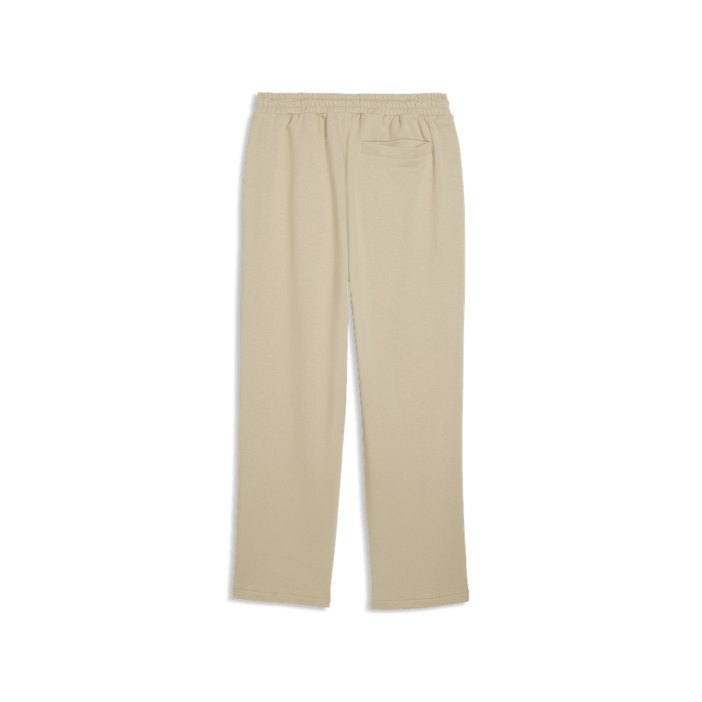 Puma men's Wardrobe ESS relaxed track pants in black with Puma logo, soft fabric, and elastic waistband.