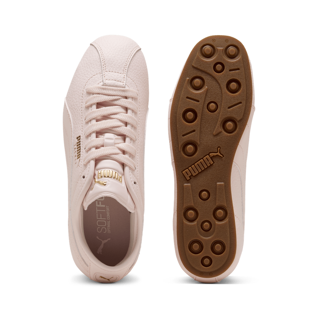 Puma Women's Tackle L sneakers in black and white, sporty athletic shoes with Puma branding and cushioned sole.