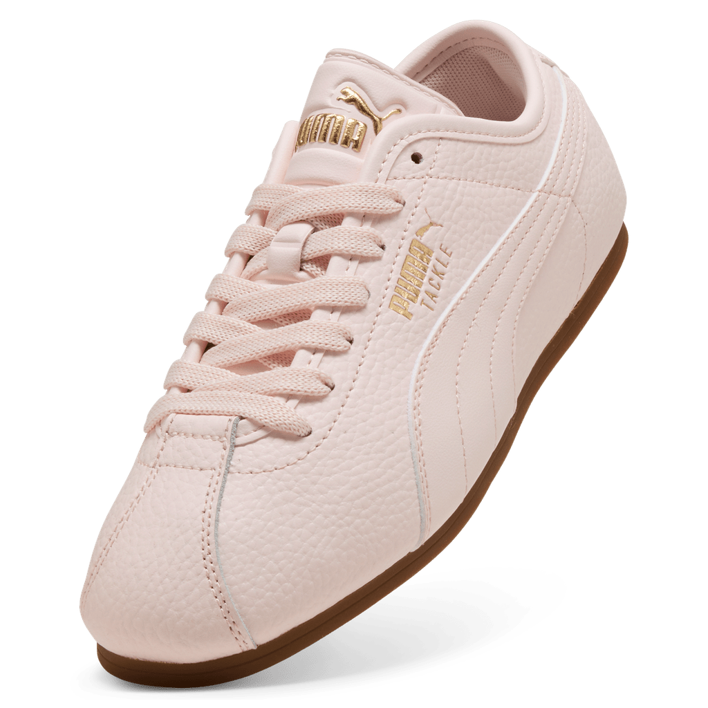 Puma Women's Tackle L sneakers in black with white accents, featuring a sporty design and cushioned sole.