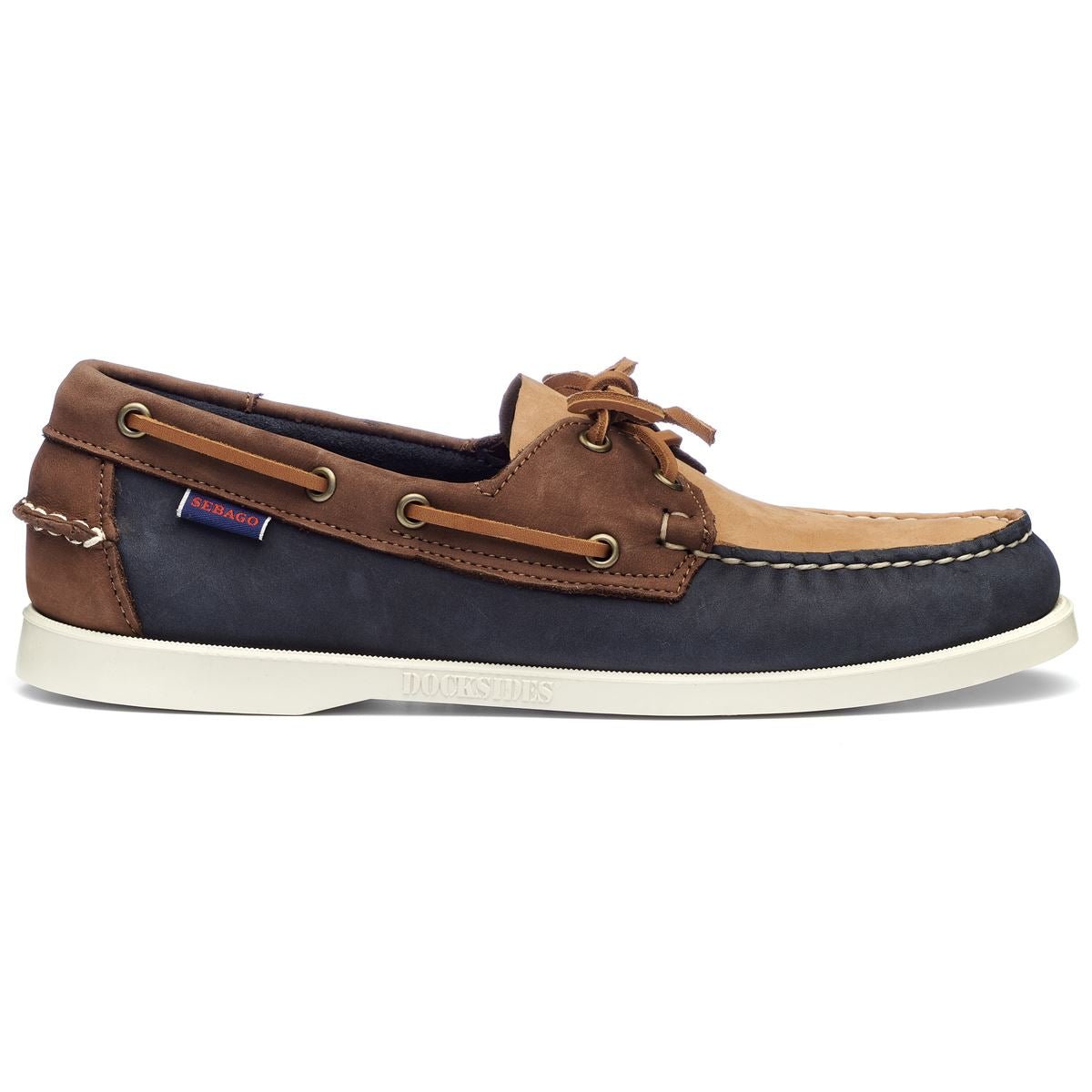 Men's Sebago Dockside Portland casual boat shoes in Spinnaker Blue navy with brown accents, featuring leather and rubber soles.