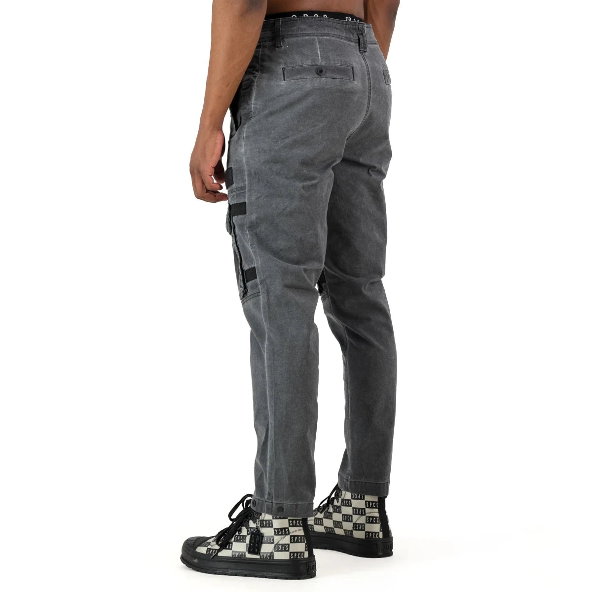 Black SPCC Alden Cargo Mens Jeans with multiple pockets and relaxed fit, displayed on a neutral background.
