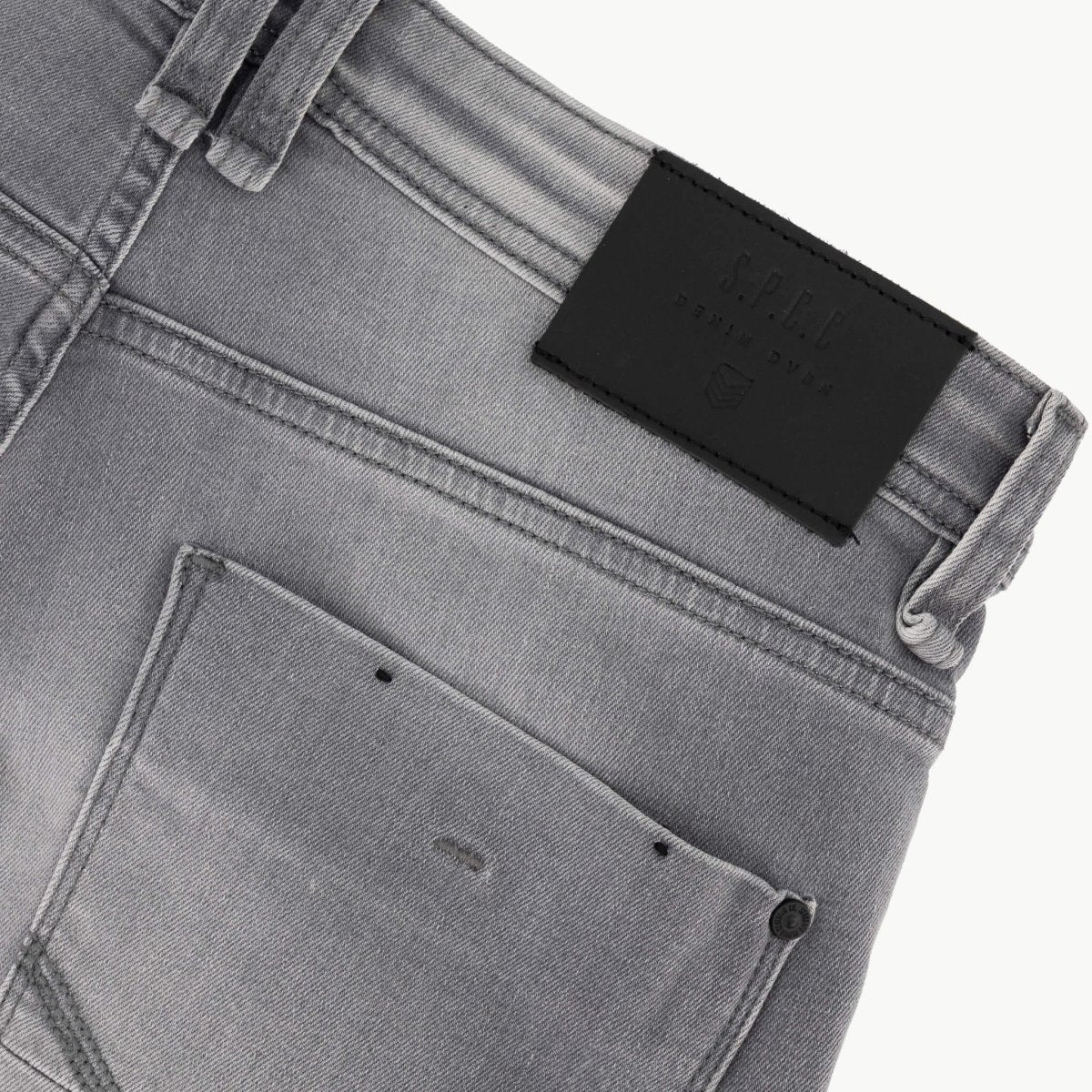 Men's SPCC Asphalt Jeans in washed grey denim, featuring a classic fit and detailed stitching.