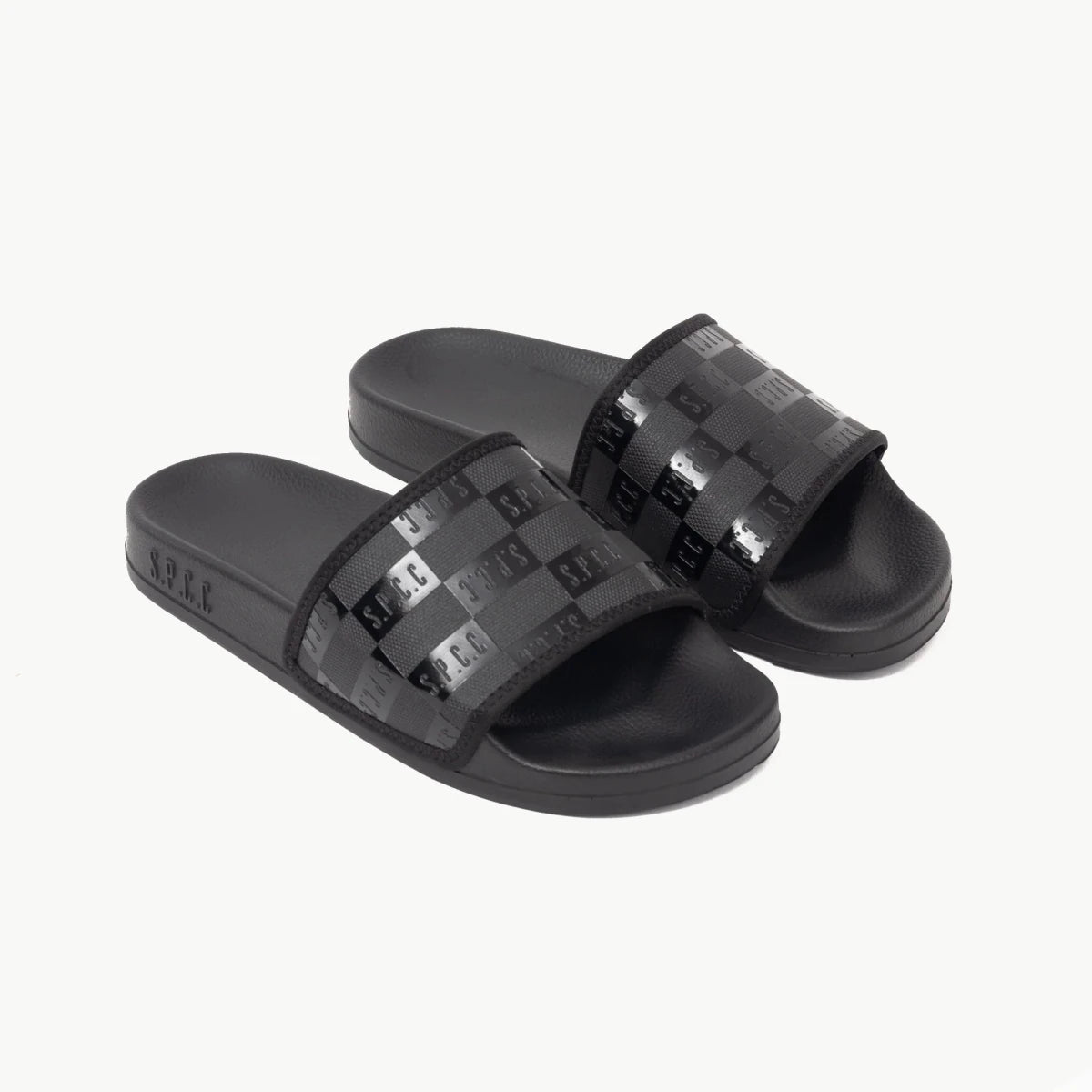 Black men's SPCC Dermott Slider sandals with cushioned straps and textured footbed for comfort and casual style.