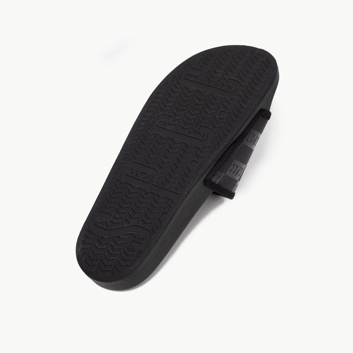 Black men's sandal from SPCC Dermott Slider collection featuring adjustable straps and cushioned footbed for comfort.