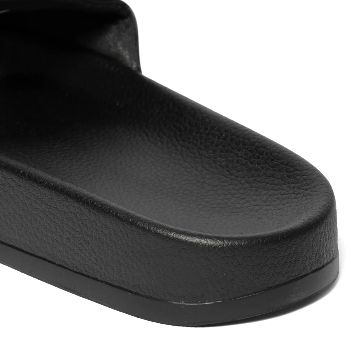 Black men's SPCC Maxim Slider sandals with wide straps and cushioned footbed, designed for comfort and casual wear.