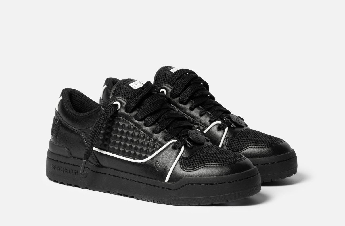 Black SPCC MDS Raider Lo men's sneakers with stylish design and comfortable fit, showcasing the sneaker's sleek profile and laces.