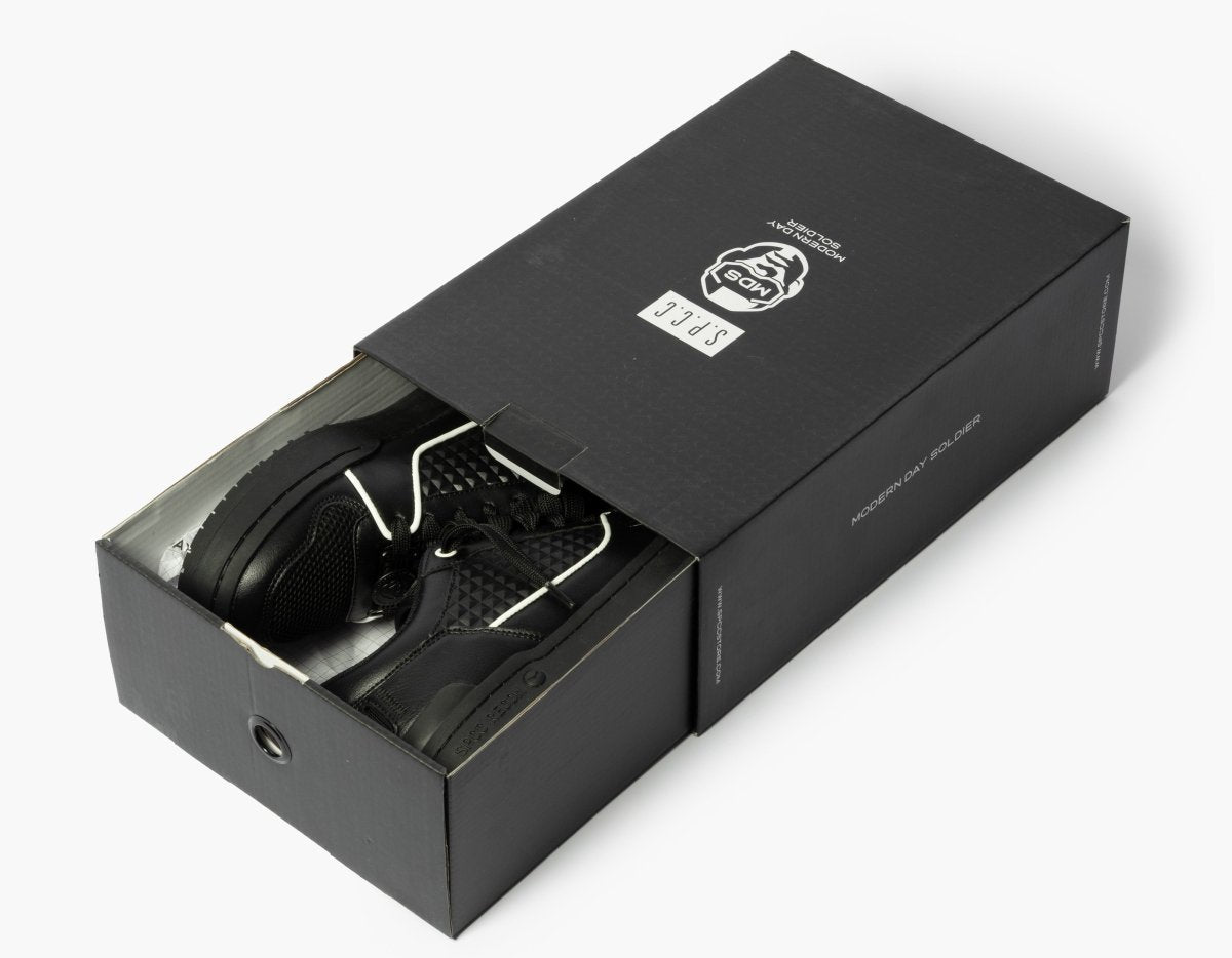 Black SPCC MDS Raider Lo men's sneakers with sleek design and comfortable fit, featuring stylish laces and durable rubber soles.