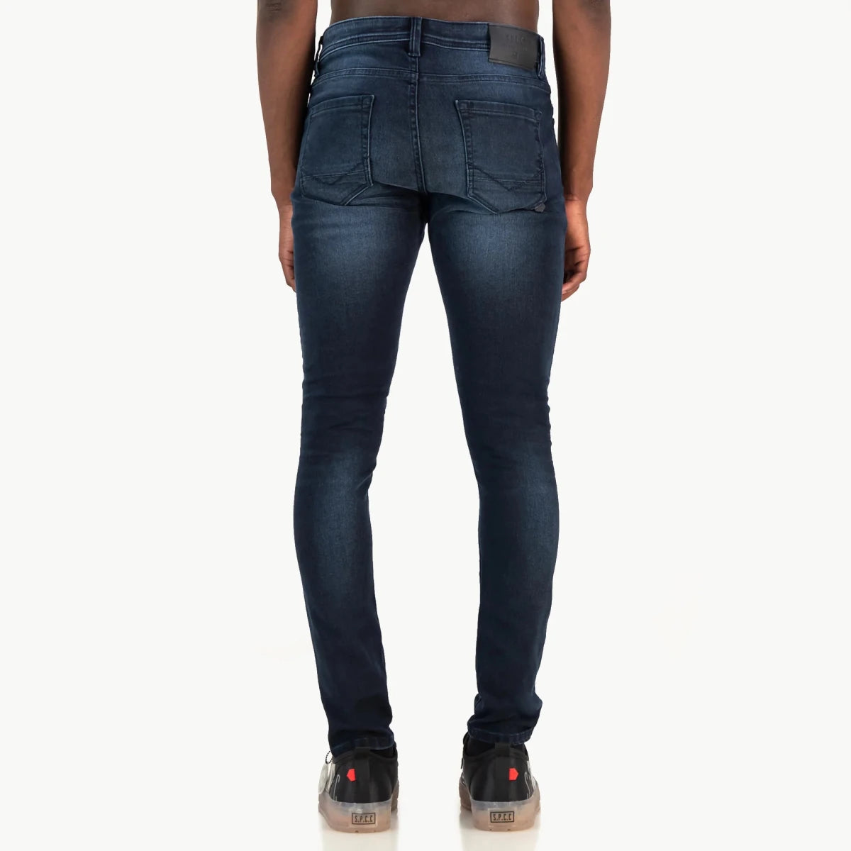 Men's SPCC Royale Indigo Jeans with classic fit, featuring denim fabric and detailed stitching.