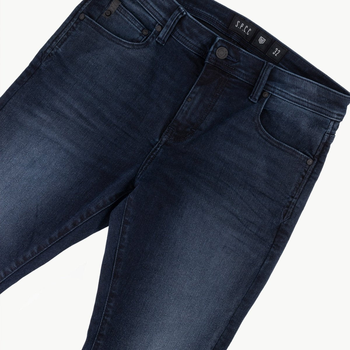 Men's SPCC Royale Indigo Jeans featuring classic fit, deep indigo denim, and visible stitching for a stylish, durable look.