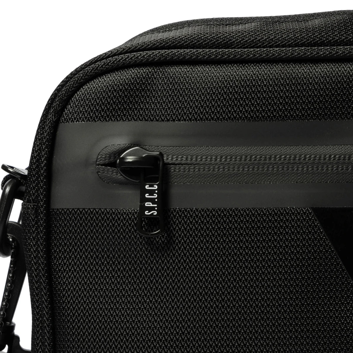 Black SPCC Surge Dust hip bag for men, compact luggage with adjustable strap and multiple compartments for convenience.