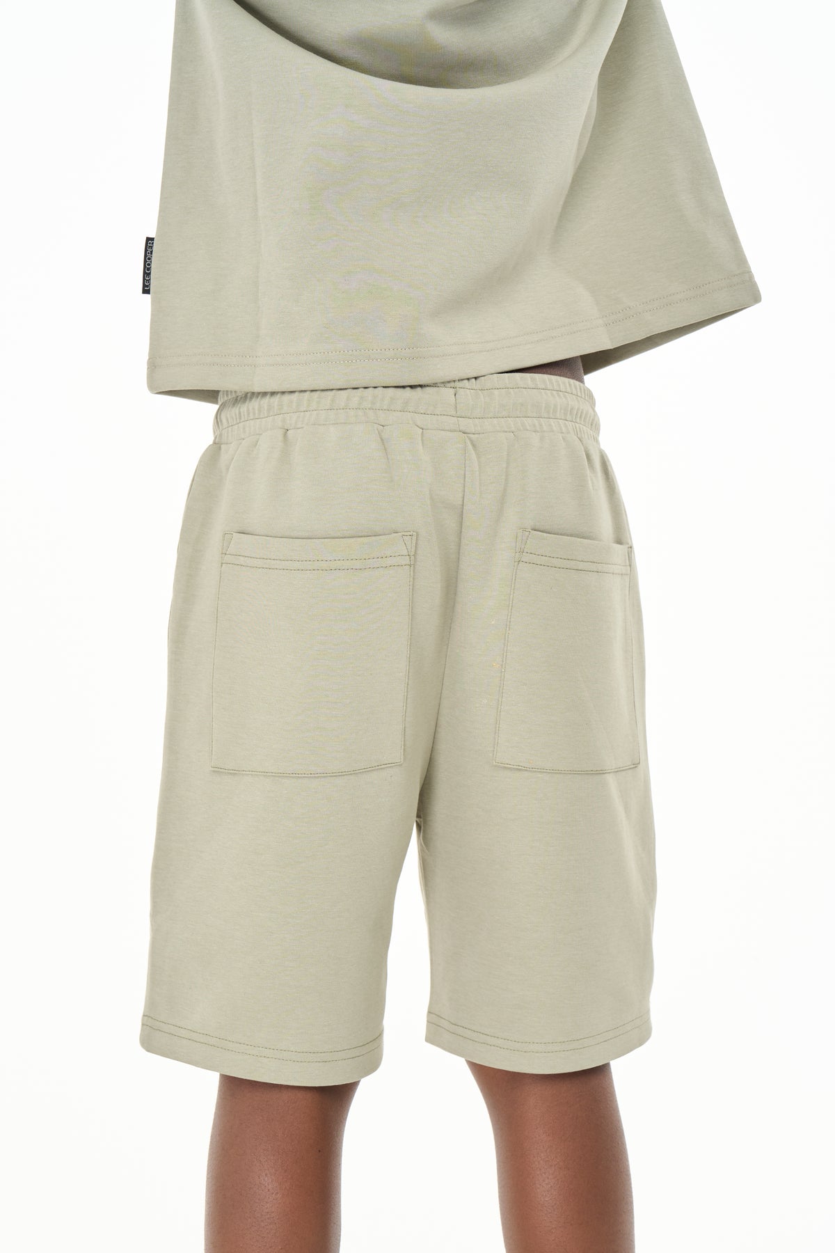 Green Lee Cooper Max boys' shorts, casual bermuda style, with comfortable fabric and adjustable waistband, suitable for kids' summer wear.
