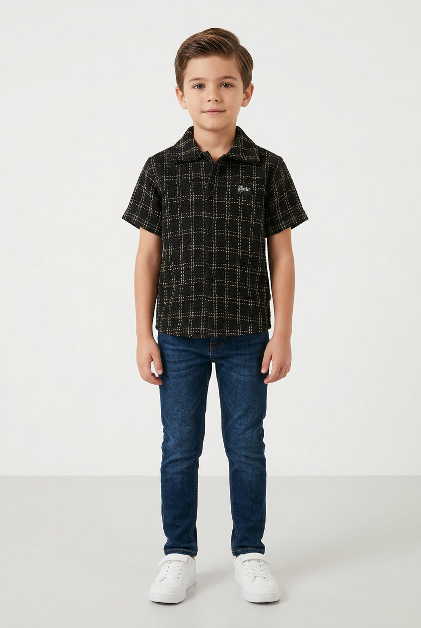 Black Soviet Tommy Kids Shirt, casual children’s shirt with a classic design, made by Soviet, displayed on a hanger.