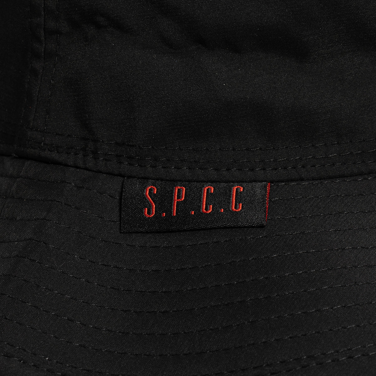 Black SPCC Recuit II bucket hat for men, stylish headwear with a wide brim, made of durable fabric.