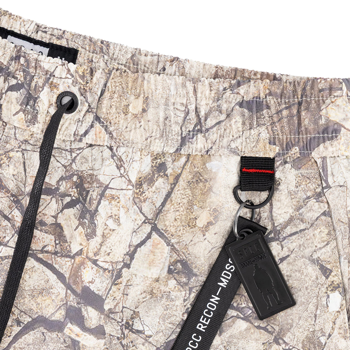 Men's SPCC Incognito Woven Shorts in stone color, casual woven bermuda shorts with a relaxed fit and stylish design.