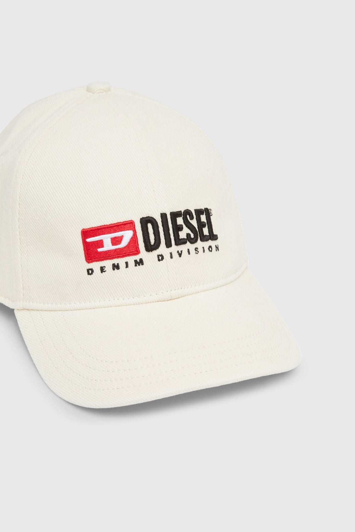 White Diesel Corry Div-Wash cap for men, showing front view with adjustable strap and Diesel logo embroidery.
