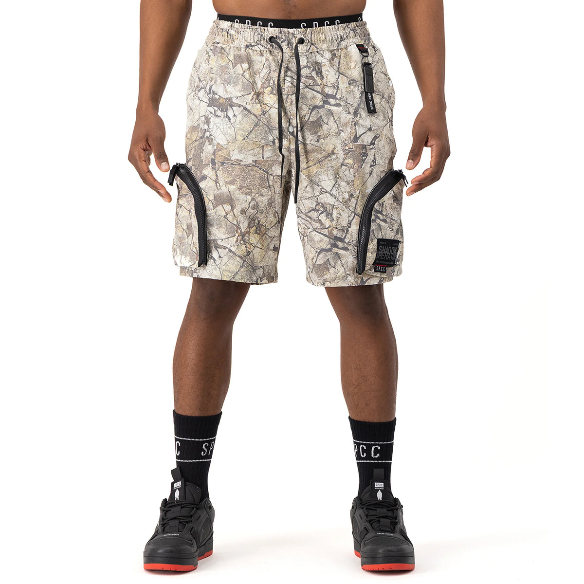 Men's SPCC Incognito Woven Shorts in stone color, casual Bermuda style with a comfortable fit and woven fabric.