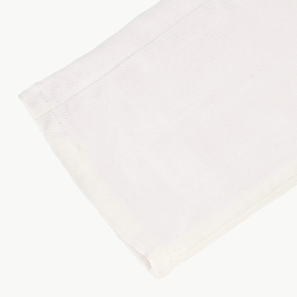White SPCC Shadowfax men's jeans displayed with a focus on the fit and denim fabric.