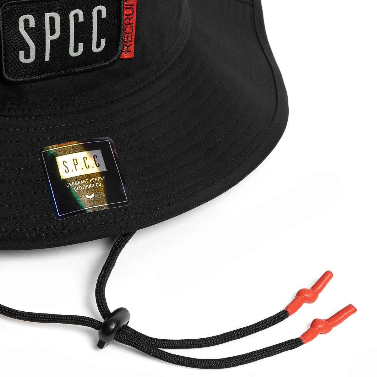 Black SPCC Recuit II bucket hat for men, stylish headwear with a wide brim, made for casual and outdoor wear.