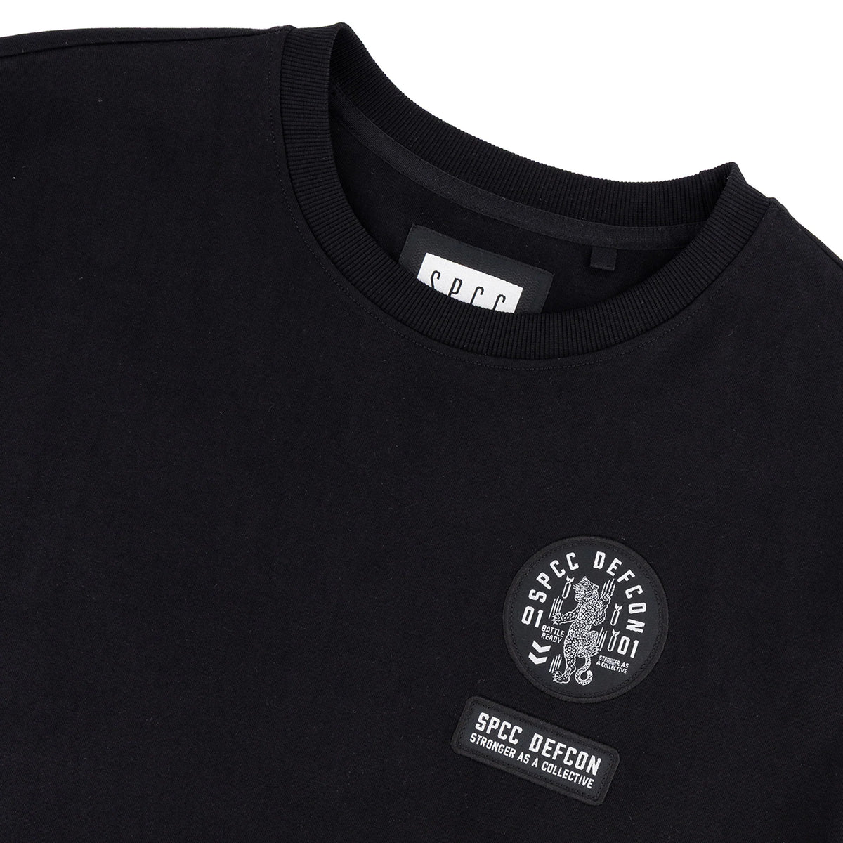 Black SPCC DEFCON Madra T-shirt for men featuring a bold graphic design and comfortable fit.